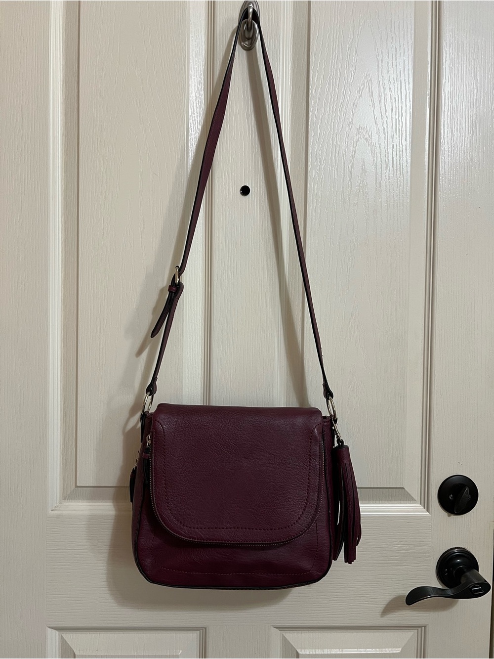 Classic Crossbody Bag with Tassel Accent